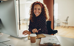 Woman smiling learn how To Read Your Contact Lens Prescription